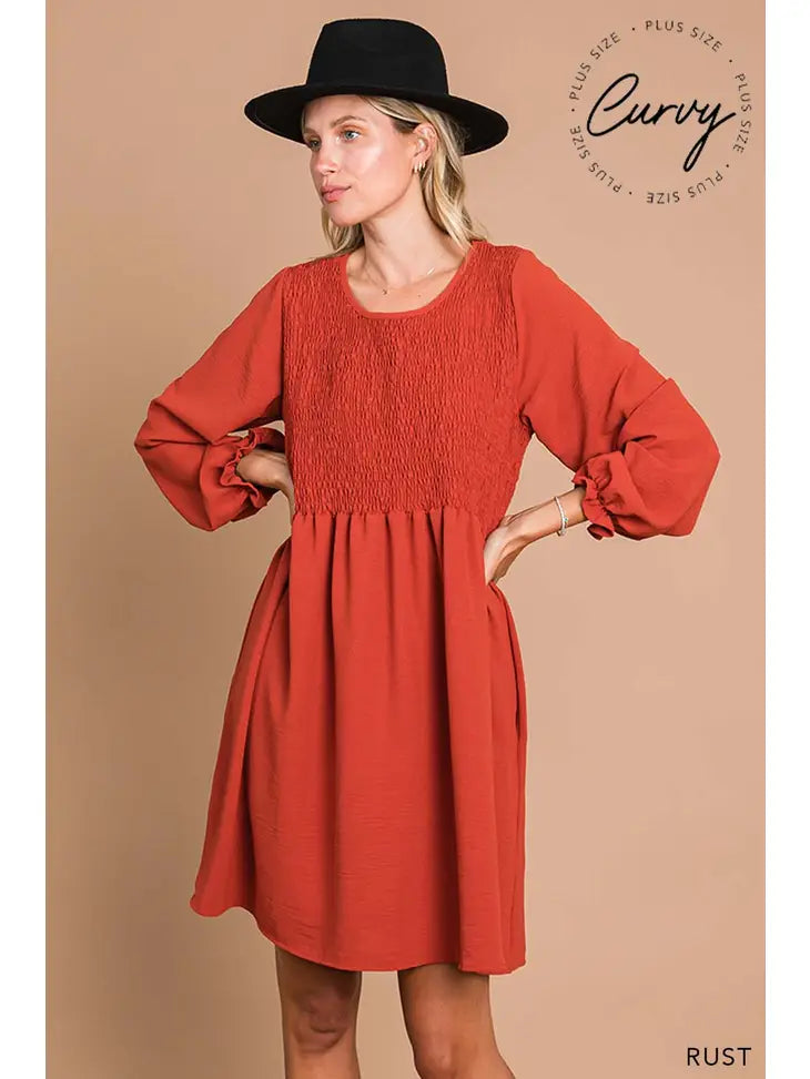 Smocked long sleeve plus dress